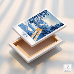Ruka Ski Trail Print - Finland Slopes Poster, Snow-Covered Forest Wall Art displayed on a wooden box.