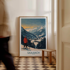 Saalbach Ski Print - Austria displayed in a modern home interior, showcasing snowy mountains and a skier.