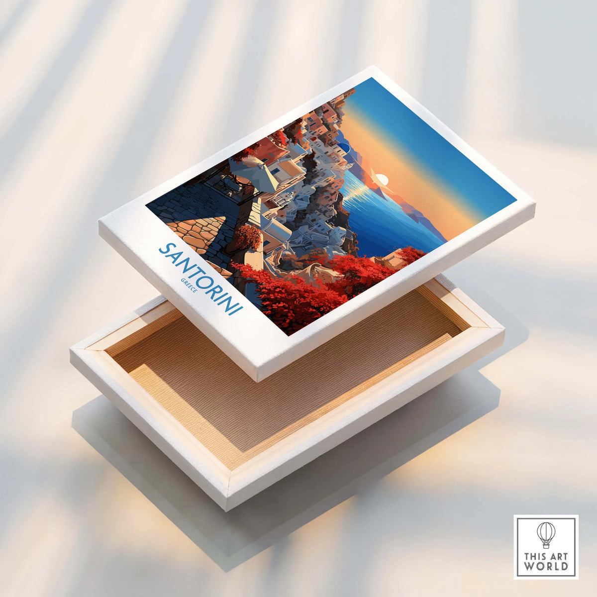 Santorini Art Print displayed on a box, showcasing vibrant colors and Mediterranean scenery for home decor.