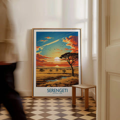 Framed Serengeti National Park travel poster with sunset and acacia tree on tiled floor