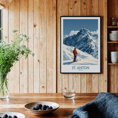 St. Anton Ski Poster displayed in a rustic home decor setting, showcasing beautiful mountain scenery and skiing.
