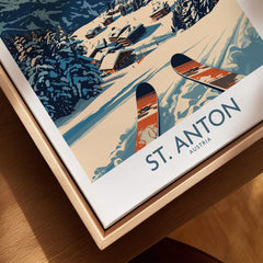 St. Anton Wall Art Ski Poster featuring skis and a snowy landscape with charming alpine houses.