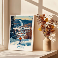 Stowe Vermont Ski Village Art - Mountain View Poster Print featuring a skier in a winter landscape by a sunny window.