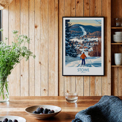 Stowe Vermont Ski Village Art - Mountain View Poster Print displayed in a cozy wooden room with winter decor.