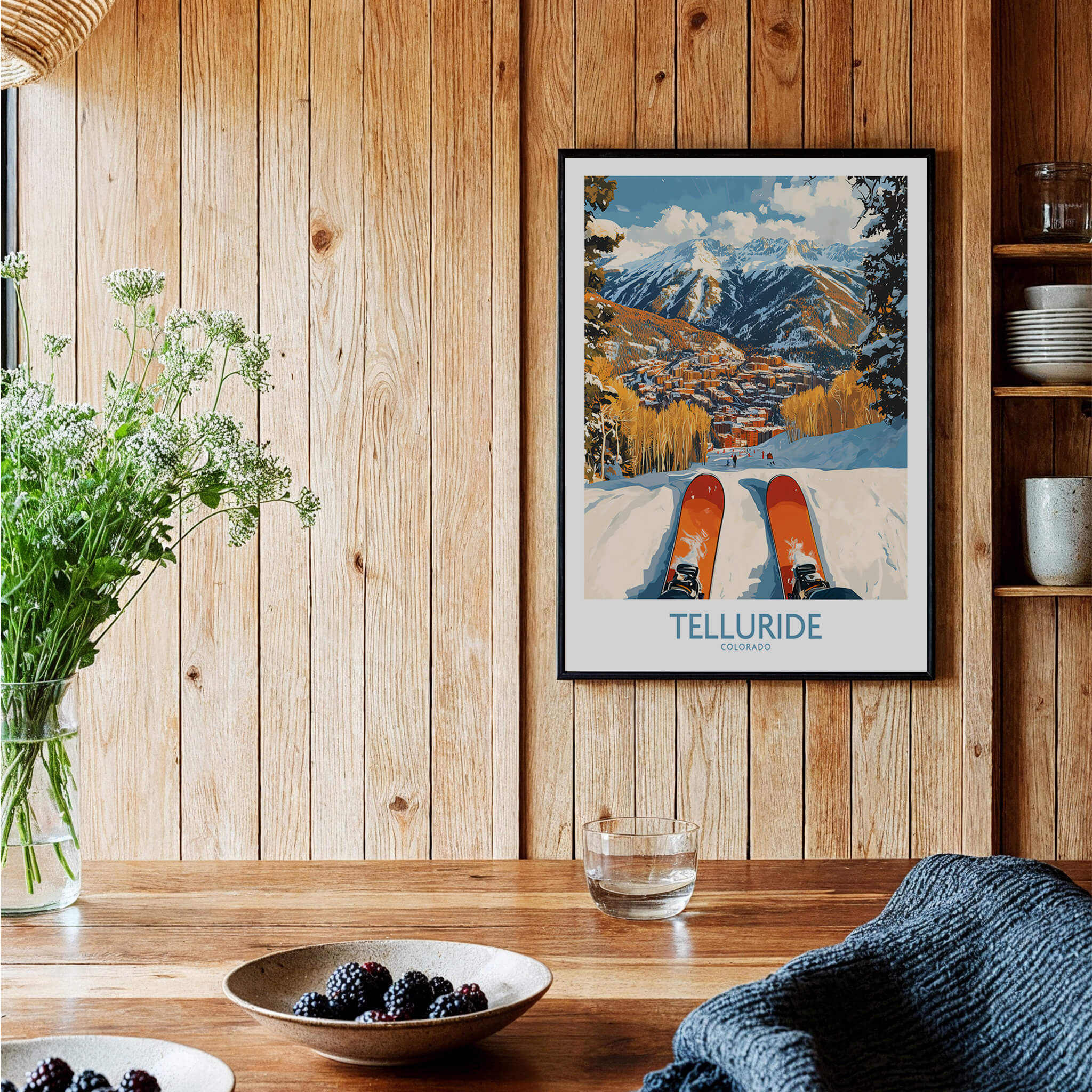 Telluride Wall Art Ski Poster displayed in a cozy interior, showcasing stunning mountain scenery and skiing excitement.