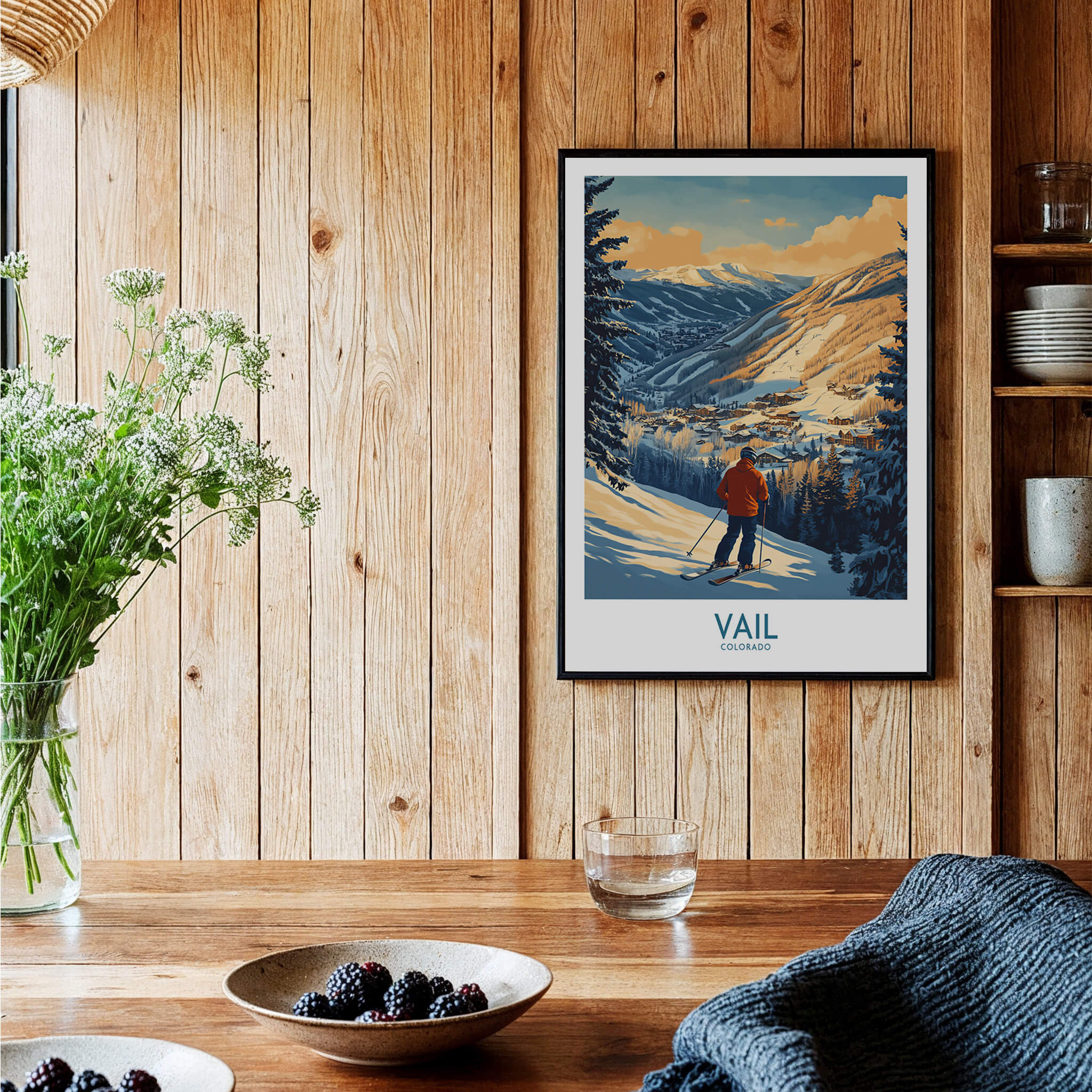 Vail Poster Colorado Ski Print displayed in a cozy room with wooden walls and greenery, perfect for ski lovers.