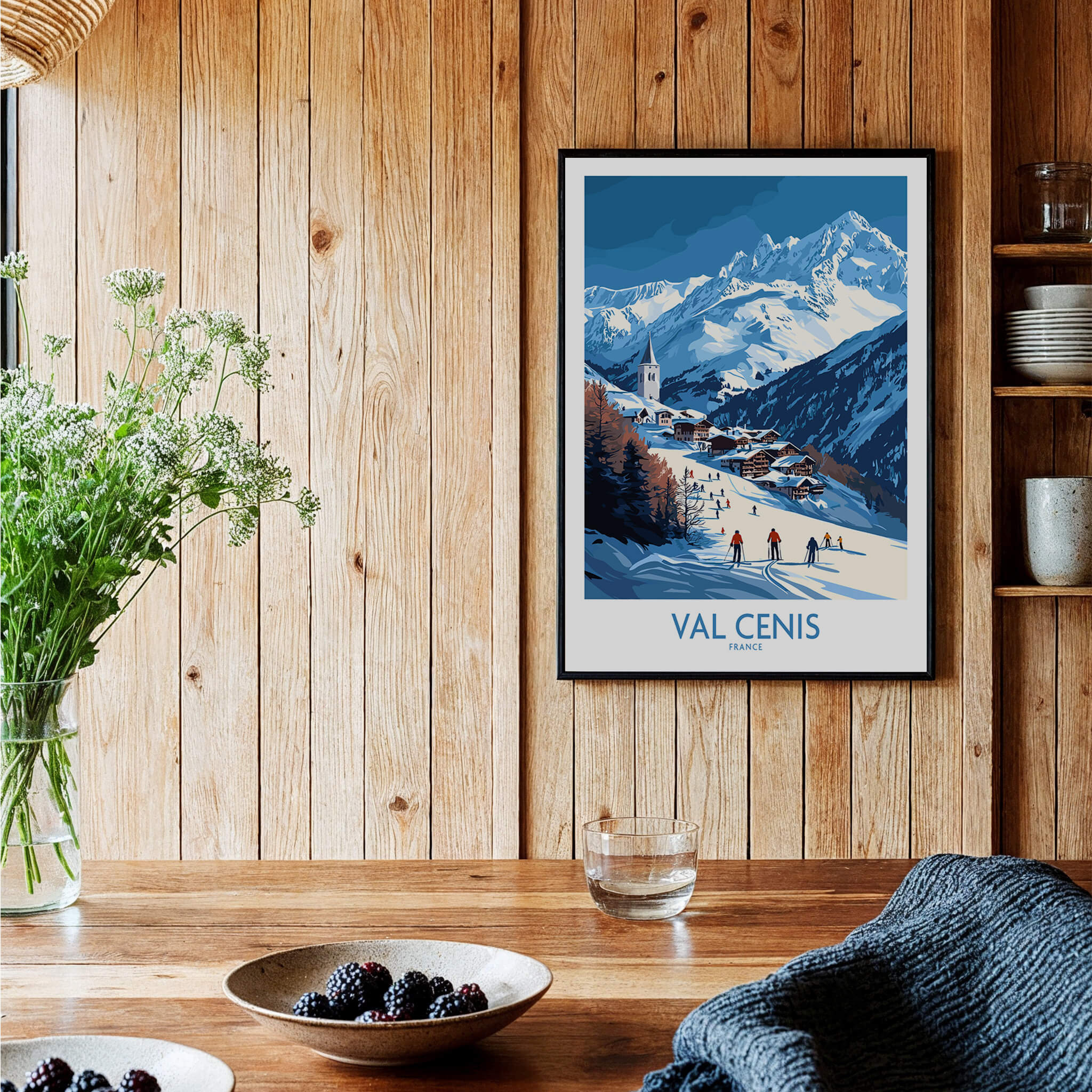 French Alps Wall Art | The Ski Chalet and Slopes of Val Cenis poster with skiers in scenic mountain backdrop.