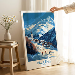 French Alps Wall Art | The Ski Chalet and Slopes of Val Cenis poster with skiers and mountains in the background.