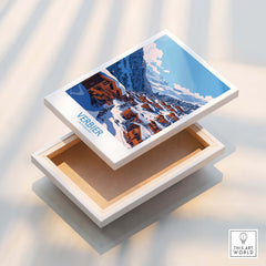 Verbier Travel Poster displayed on a wooden box, featuring the picturesque ski resort of Verbier.