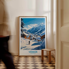 Verbier Ski Poster Switzerland in a cozy interior, featuring snow-covered mountains and a skier.