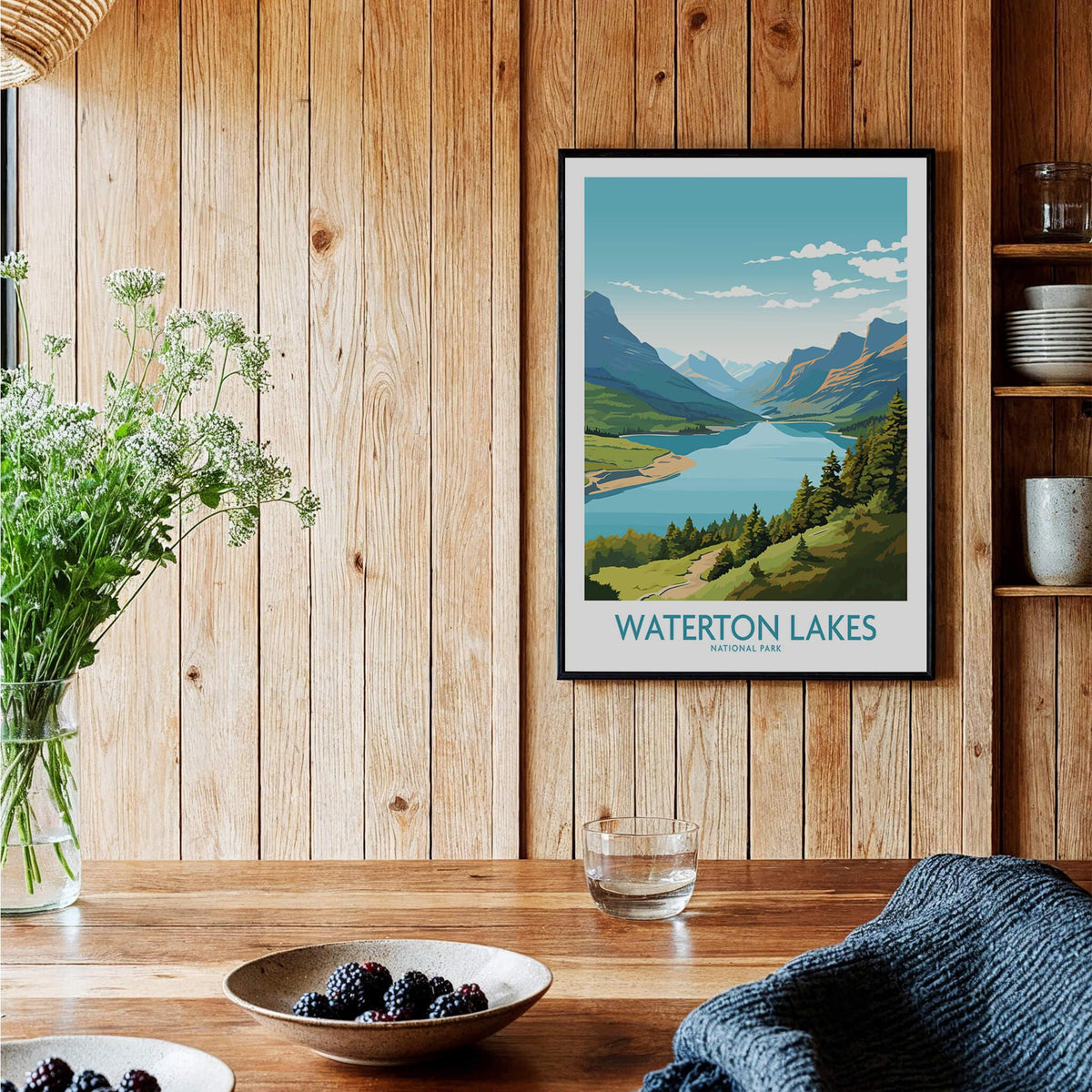 Waterton Lakes National Park art print in black frame on wood wall in cozy kitchen setting