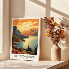 Waterton Lakes National Park art print with sunset mountains on window sill beside vase of dried flowers