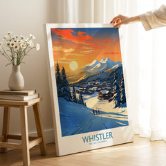 Whistler Wall Art Ski Poster showcasing a stunning ski landscape at sunset with snow-covered mountains and cozy cabins.
