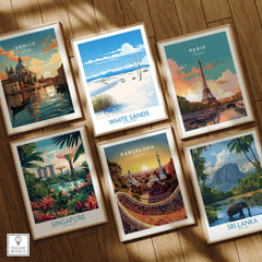 Set of six framed travel posters featuring Venice, White Sands, Paris, Singapore, Barcelona, and Sri Lanka on a wooden floor.