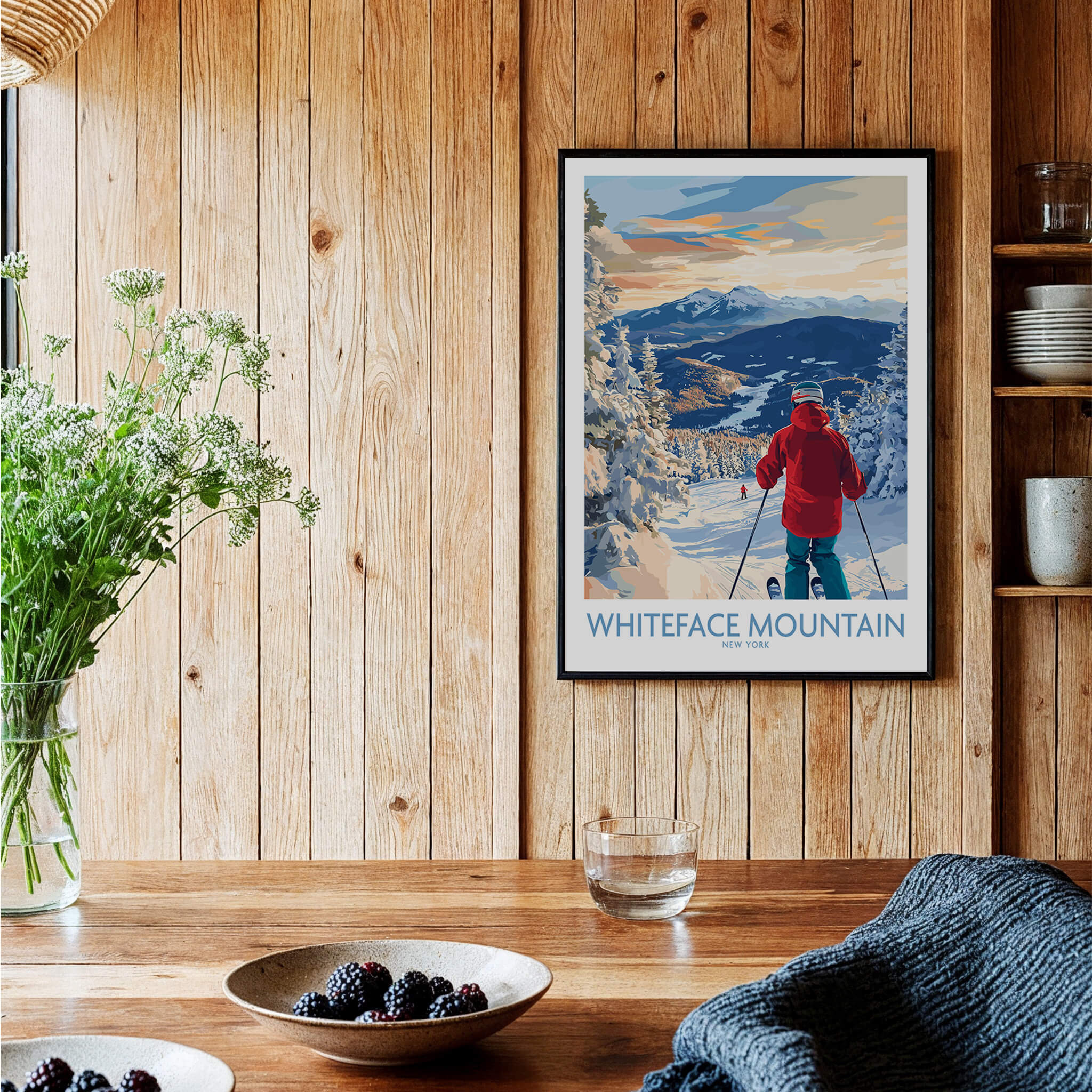 Whiteface Mountain Ski Wall Art Ski Print displayed in a cozy interior setting with a skier and wooden decor.