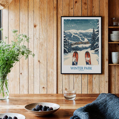 Winter Park Ski Print - Colorado displayed in a cozy home setting with wooden walls and a rustic table.