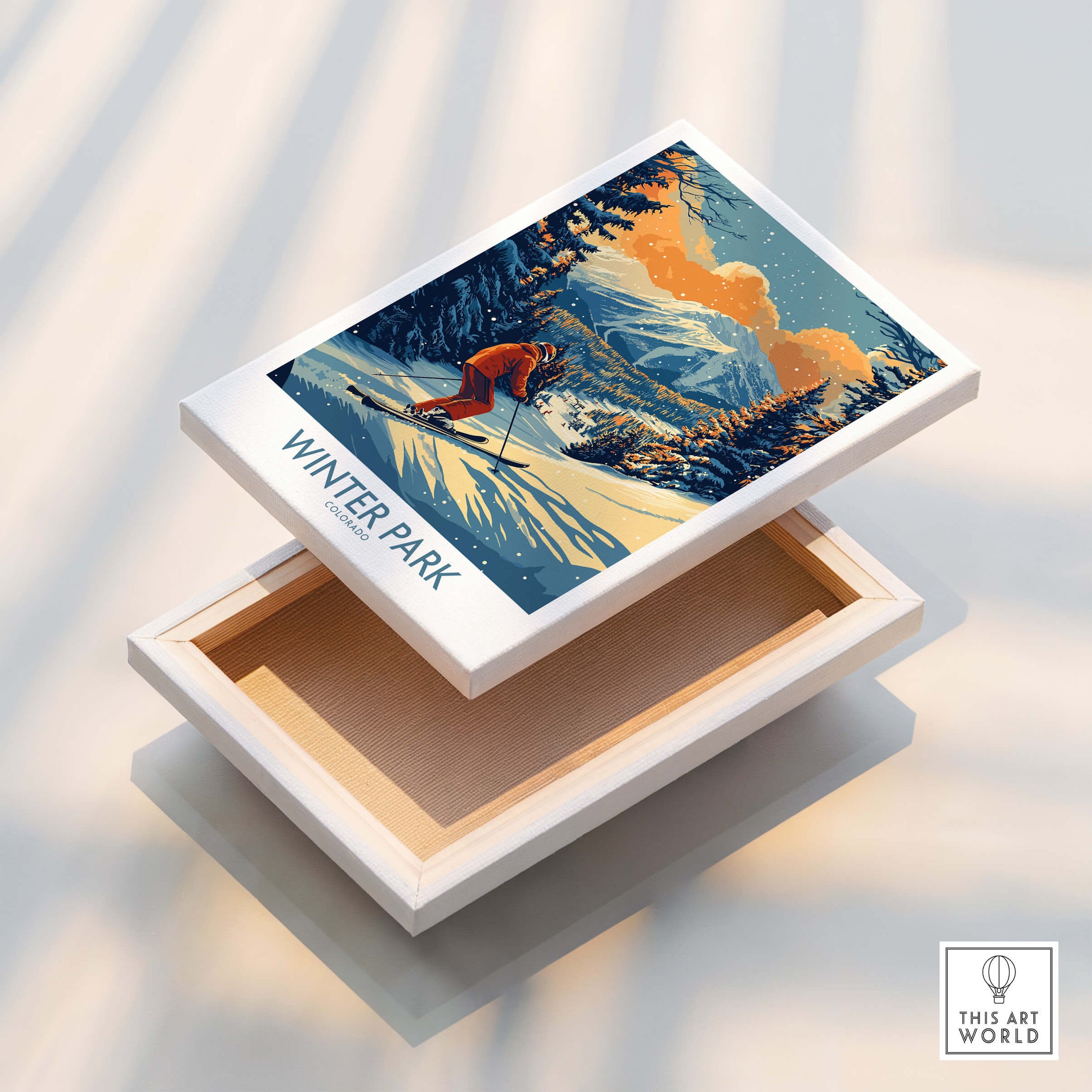 Winter Park Poster Colorado Ski Print displayed on a wooden box, showcasing a skier in a snowy mountain landscape.