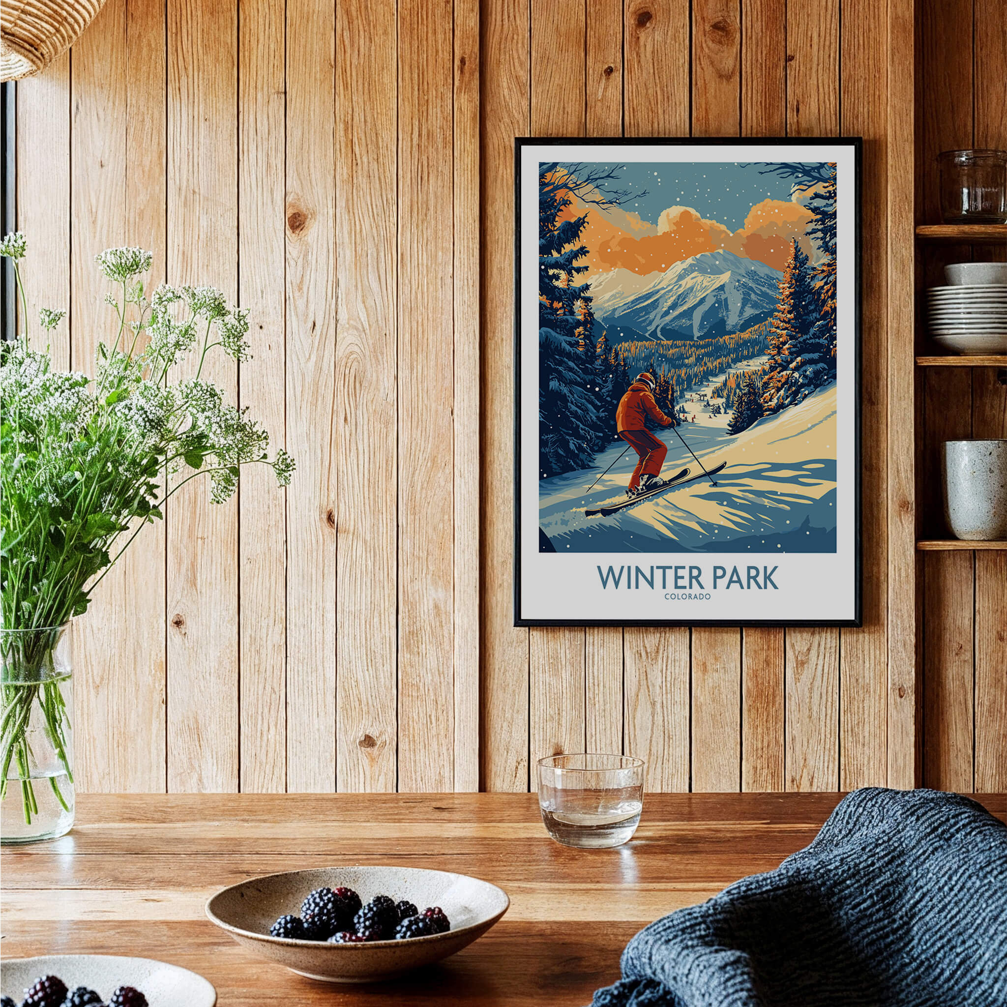 Winter Park Poster Colorado Ski Print showcasing a skier against a mountain backdrop in a cozy home setting.