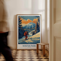 Winter Park Poster Colorado Ski Print featuring a skier on a snowy slope with mountains in the background.