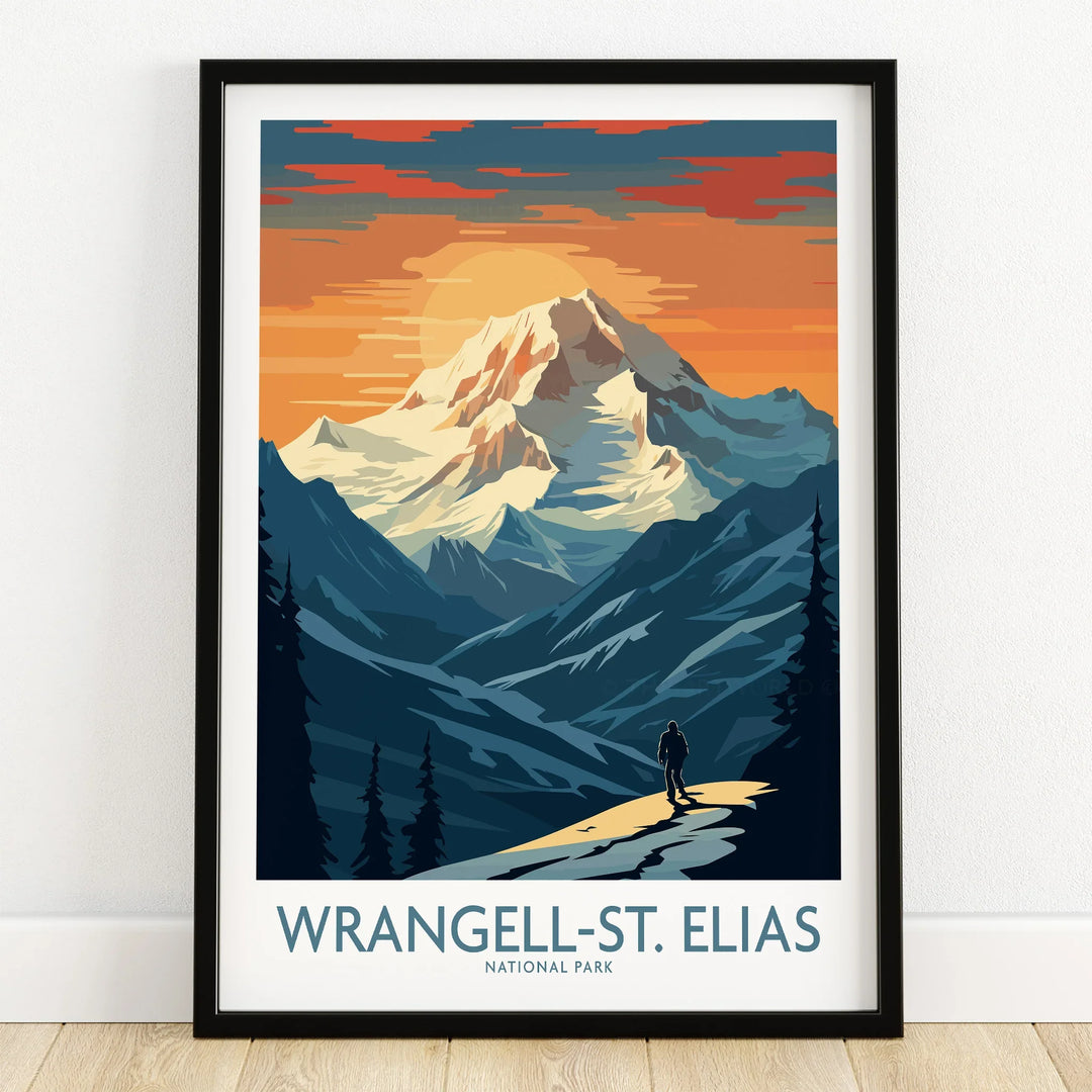 Wrangell-St. Elias National Park art print in black frame on wooden floor, mountain sunset