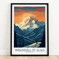 Wrangell-St. Elias National Park art print in black frame on wooden floor, mountain sunset
