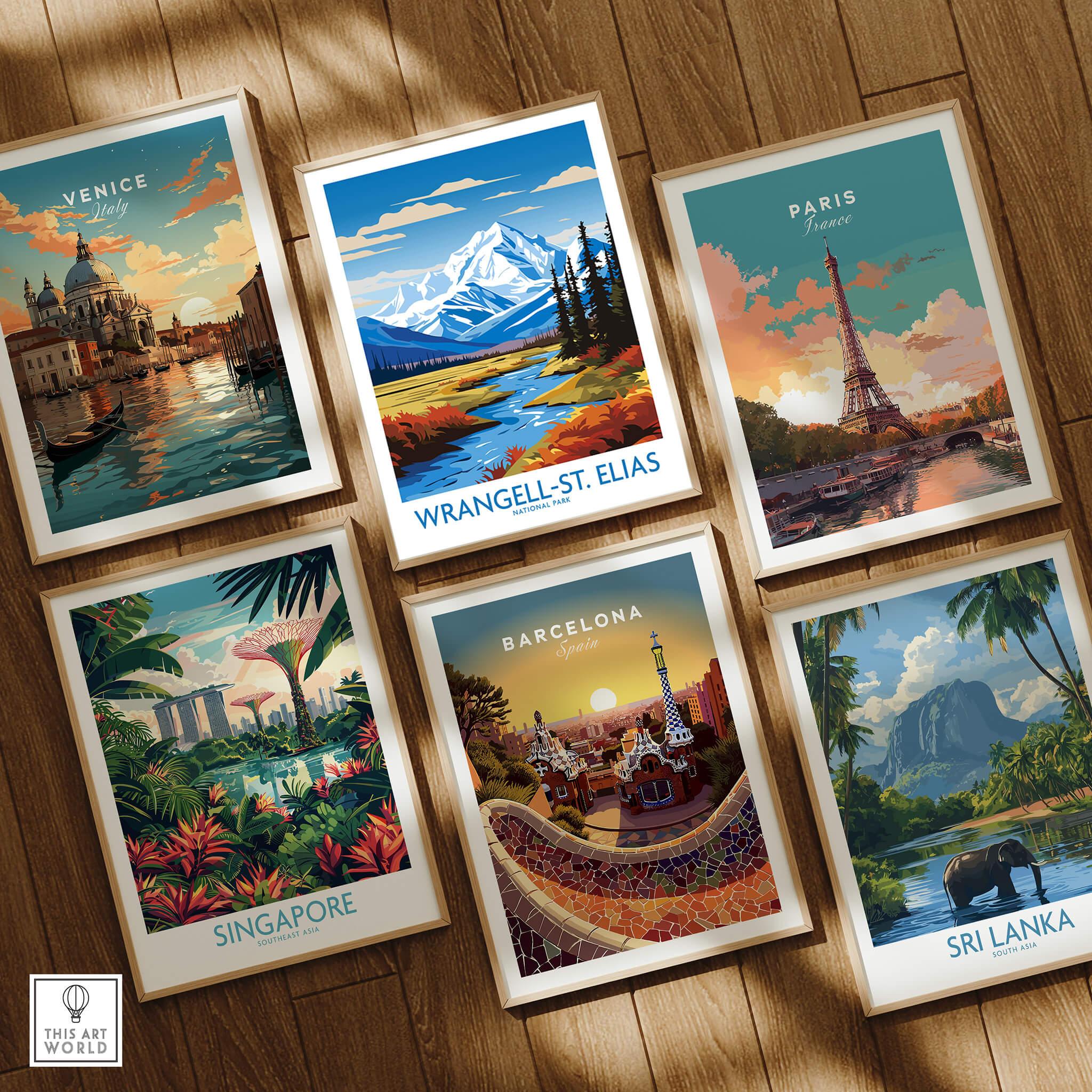 Set of six framed travel posters featuring Venice, Paris, Barcelona, Singapore, Sri Lanka, and Wrangell-St. Elias on a wooden floor.