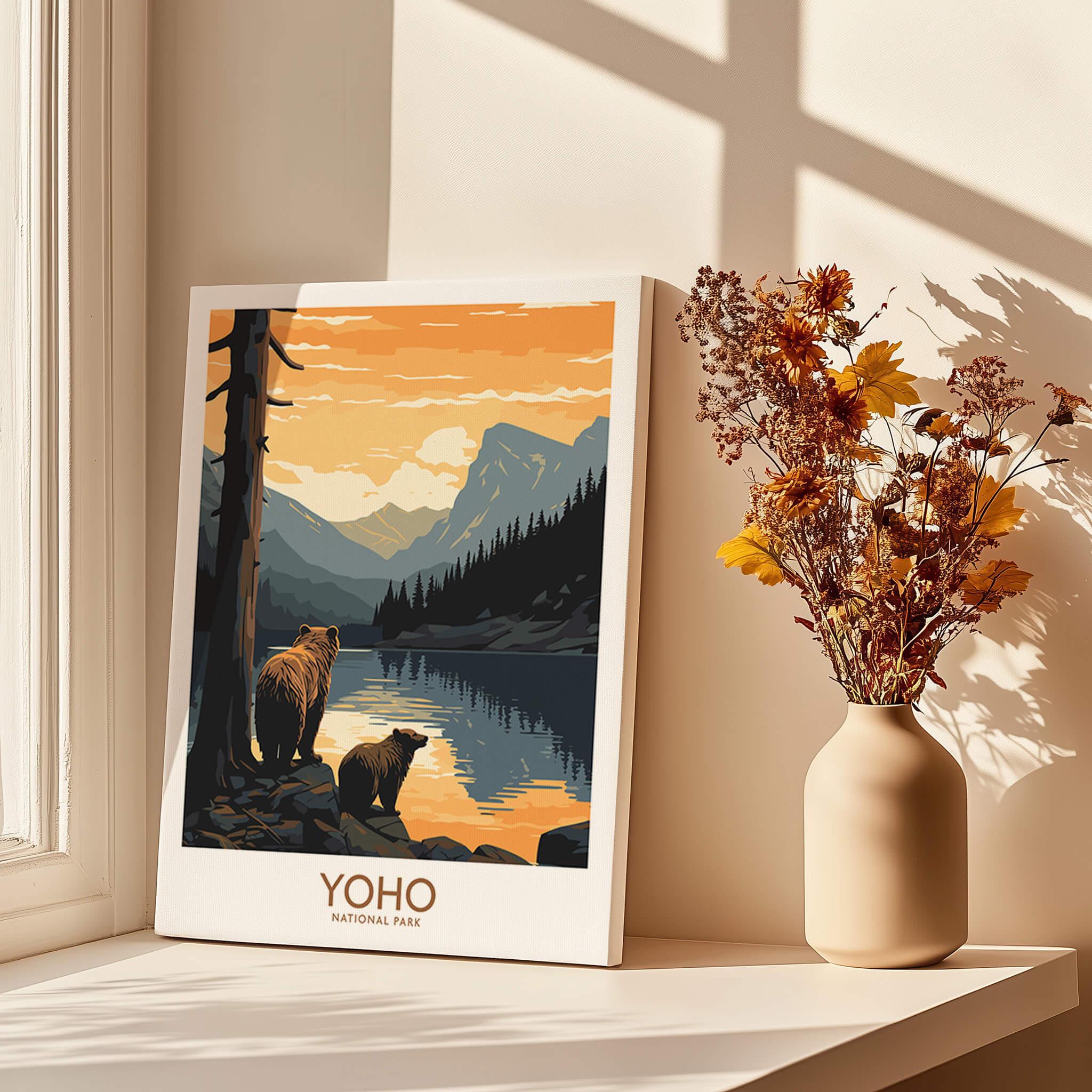Yoho National Park art print with bears and mountain lake, displayed by window with dried flowers