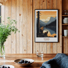 Yoho National Park art print with bears by a mountain lake, framed and displayed in a rustic kitchen setting.