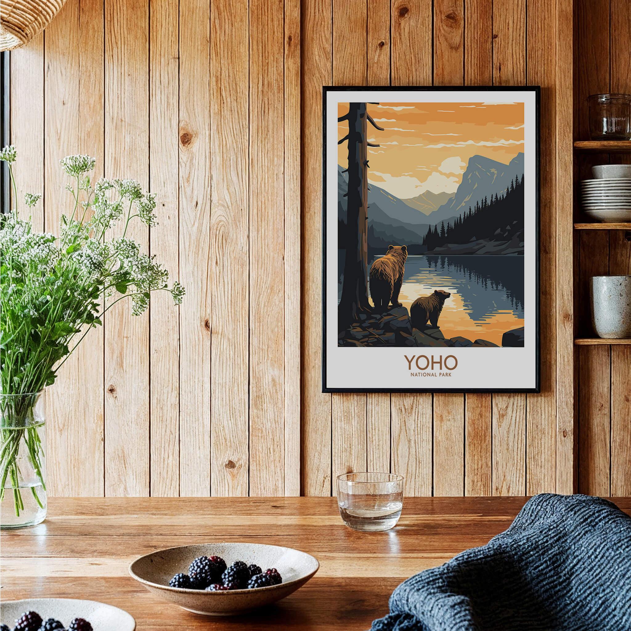 Yoho National Park art print with bears by a mountain lake, framed and displayed in a rustic kitchen setting.