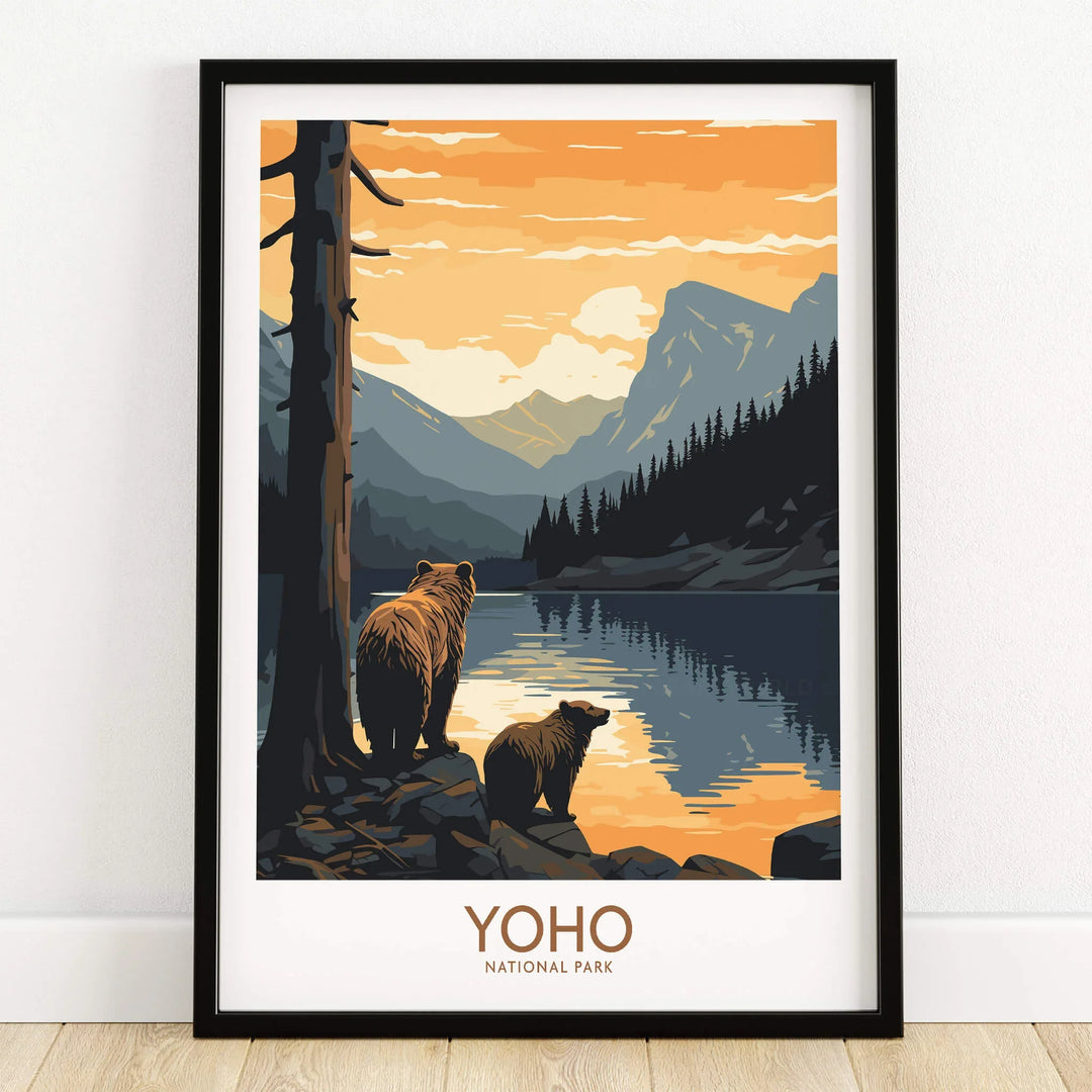 Yoho National Park art print with bears by a lake, mountains and pine trees, in black frame.