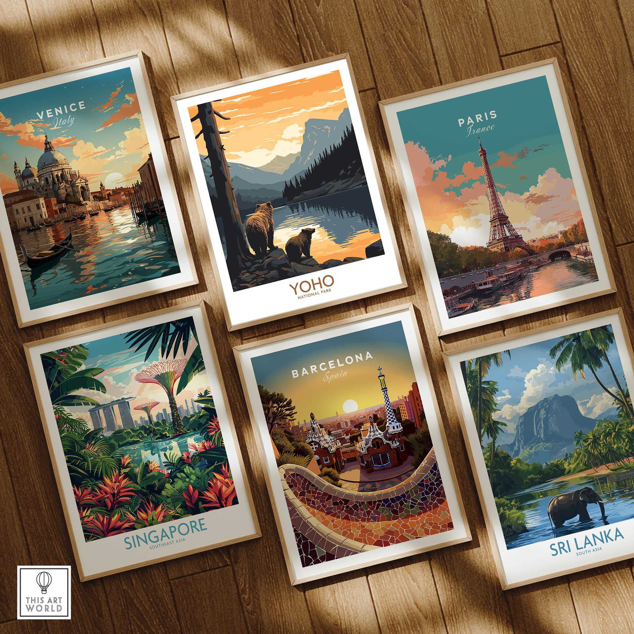 Set of six framed travel posters featuring Venice, Yoho National Park, Paris, Singapore, Barcelona, and Sri Lanka on a wooden floor.