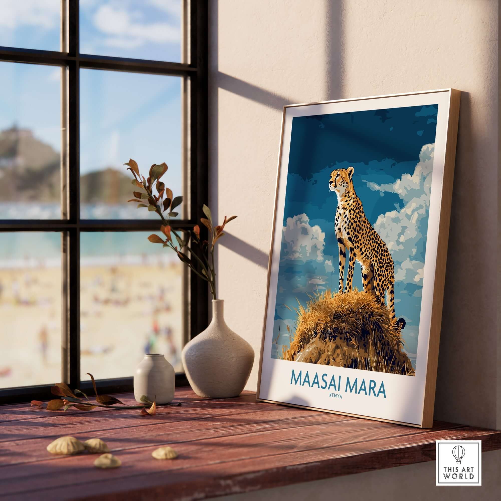 Maasai Mara Poster Kenya featuring a cheetah displayed on a table near a window.