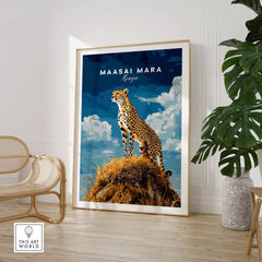 Maasai Mara Print Kenya featuring a cheetah standing on a rock with blue sky backdrop in a stylish interior setting.