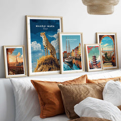 Maasai Mara Print Kenya featuring a cheetah among framed artworks in a stylish interior.
