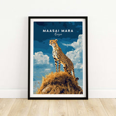 Maasai Mara Print Kenya featuring a cheetah on a rock with a blue sky and white clouds, perfect for safari lovers.