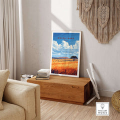 Maasai Mara Wall Art displayed in a cozy room, featuring vibrant colors of the African savannah.