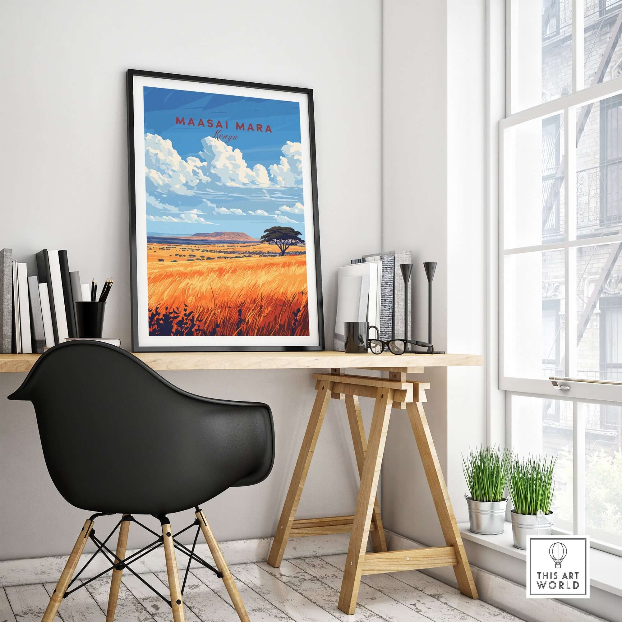 Maasai Mara Wall Art print displayed in a stylish modern workspace with greenery and natural light.