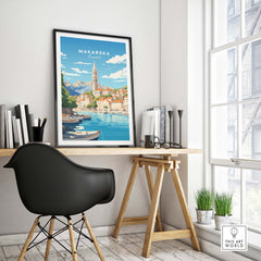 Makarska poster art print displayed in a modern office setting, showcasing scenic views of Croatia's coast and architecture.