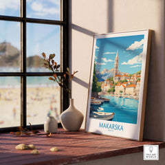 Makarska wall art print featuring scenic coastal view of Croatia with mountains and boats, displayed in a stylish interior.