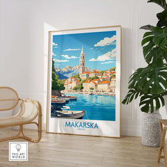 Framed Makarska wall art depicting coastal scenery and a historic tower in Croatia, enhancing home decor with travel aesthetics.