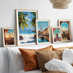 Maldives Poster - Tropical Beach Scene displayed among other travel posters in a stylish home setting.