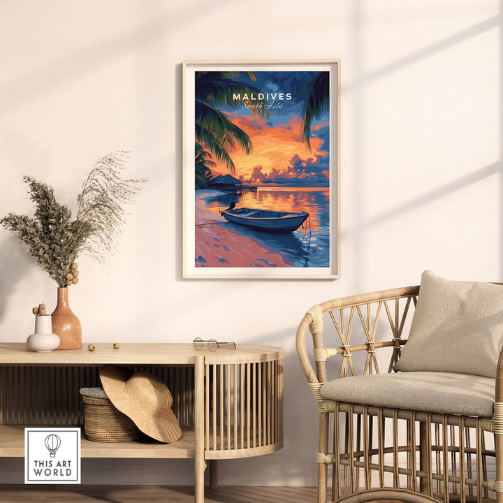 Maldives sunset travel print framed on wall, showcasing vibrant colors and serene beach scene with boat.