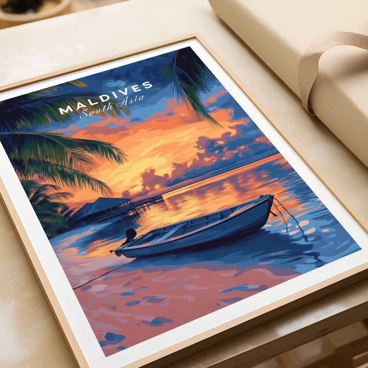 Maldives travel print featuring a tranquil sunset over water with a small boat and palm trees. Perfect for travel enthusiasts.