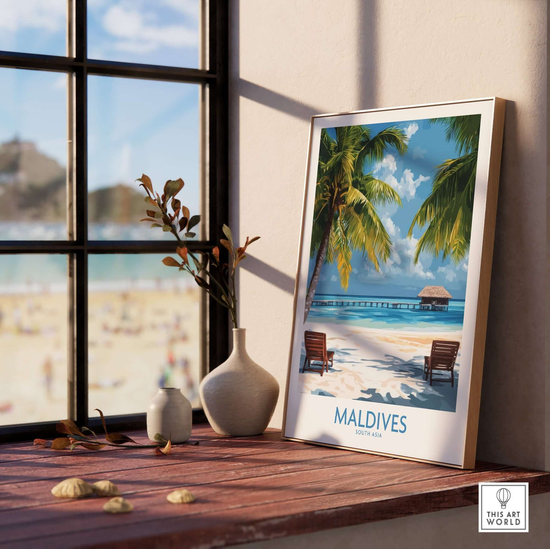 Beautiful Maldives wall art poster featuring a tropical beach scene with palm trees and lounge chairs in a cozy setting.