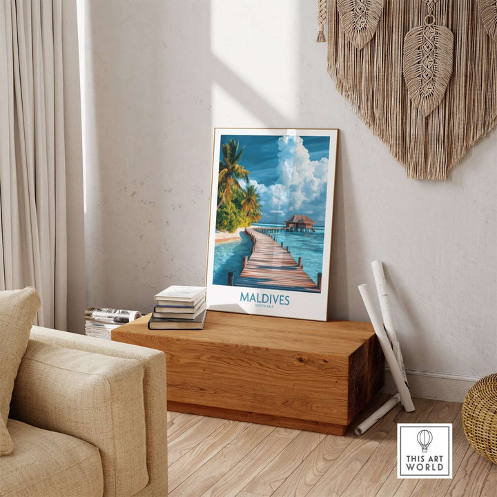 Maldives wall art print featuring a serene beach scene with a wooden pathway and tropical palm trees in a stylish interior setting.