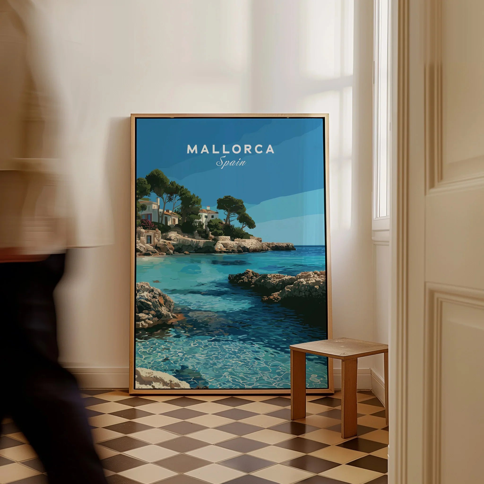 Mallorca Spain Coastal Cove Travel Poster — framed canvas on floor man walking past