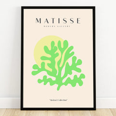 Modern abstract art print with green botanical shape, yellow circle, black frame