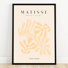 Framed abstract art poster with beige and yellow cutout shapes, minimalist wall decor