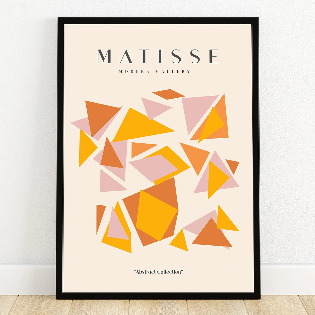 Abstract geometric art print with orange and pink triangles in black frame, modern wall decor.