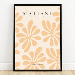 Framed abstract wall art print with beige Matisse-inspired floral shapes, modern home decor